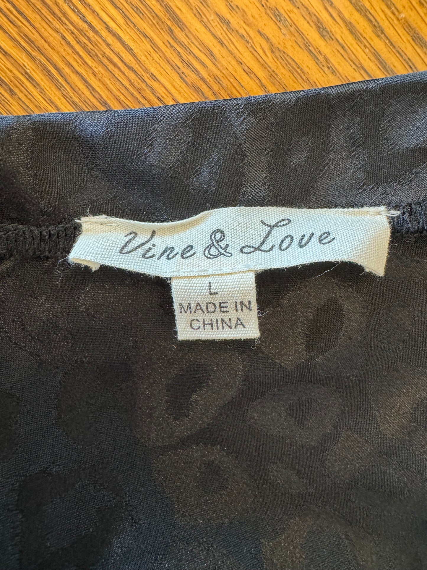 Vine & Love Black Leopard Slip Skirt